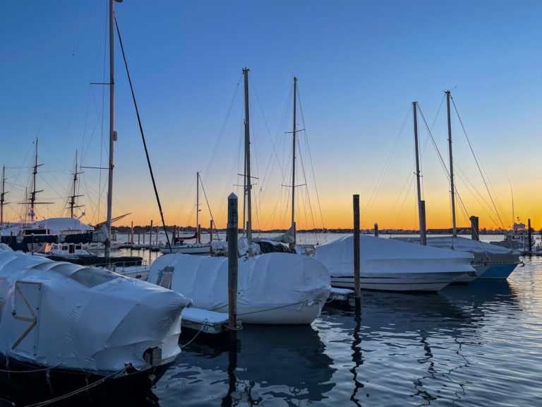 boats at sunset in newport rhode island